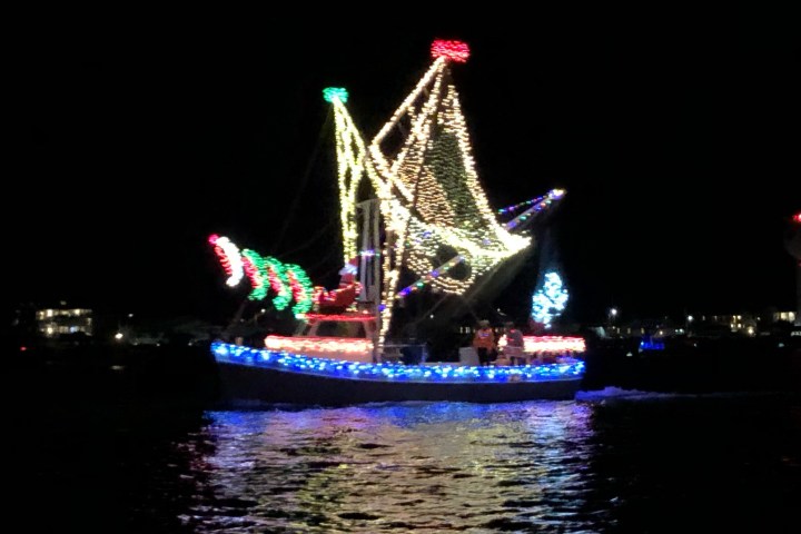 a boat that is lit up at night